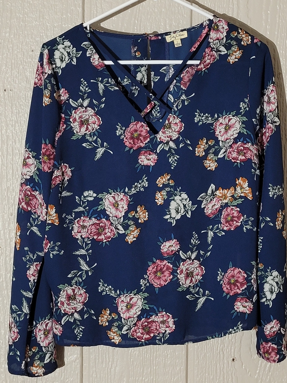Lily White Navy Floral Crisscross V-Neck Blouse